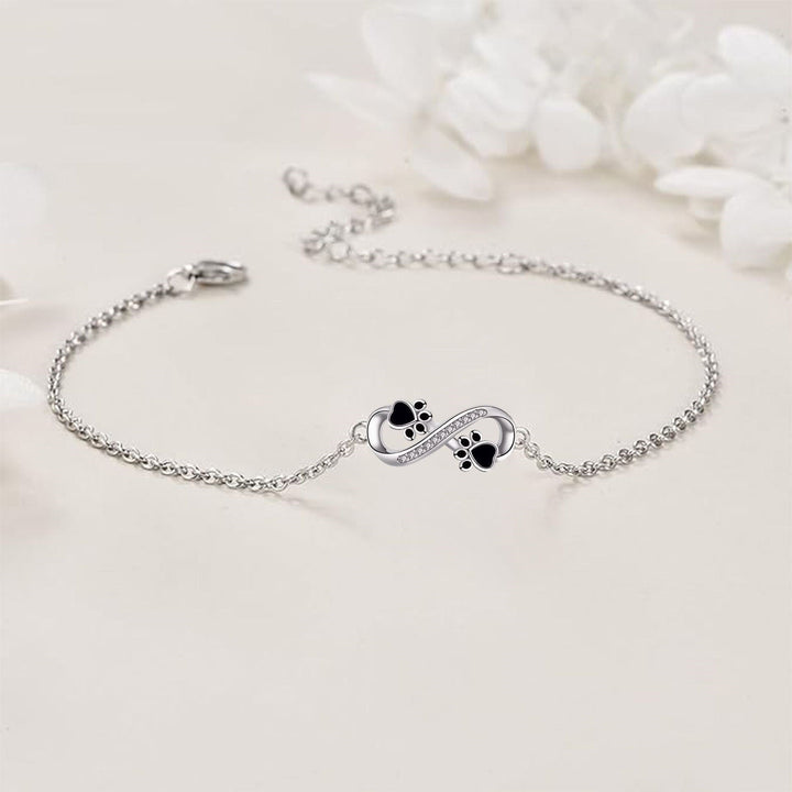 Pulsera con Charm de Huella y Símbolo de Infinito en Circonitas