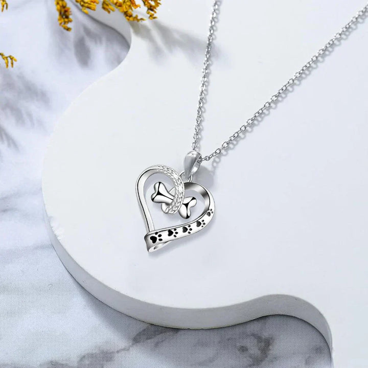 Set de 2 Piezas de Joyas: Huella, Corazón y Hueso