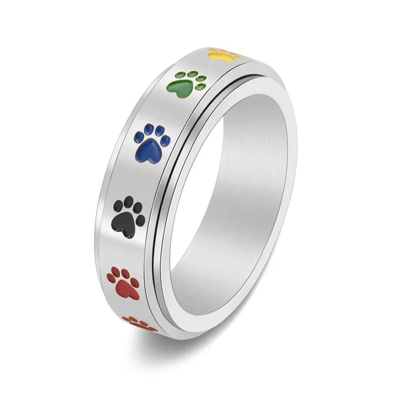 Anillo Rotatorio Antiestrés con Diseño de Huellas de Patas – Anillo de Acero Inoxidable en Colores Arcoíris