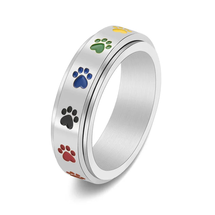 Anillo Rotatorio Antiestrés con Diseño de Huellas de Patas – Anillo de Acero Inoxidable en Colores Arcoíris