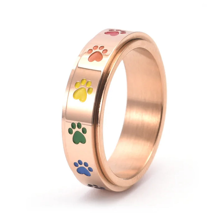 Anillo Rotatorio Antiestrés con Diseño de Huellas de Patas – Anillo de Acero Inoxidable en Colores Arcoíris
