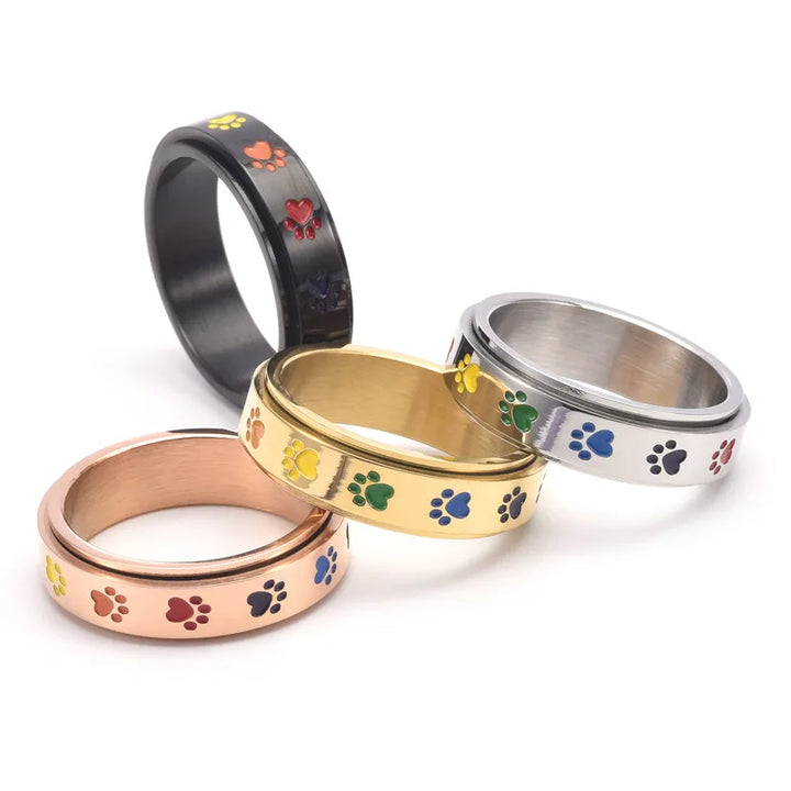 Anillo Rotatorio Antiestrés con Diseño de Huellas de Patas – Anillo de Acero Inoxidable en Colores Arcoíris