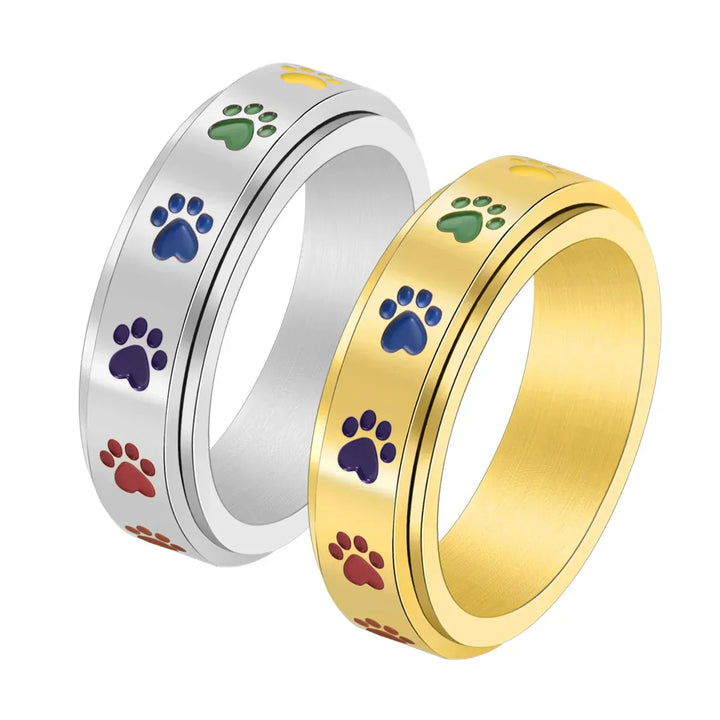 Anillo Rotatorio Antiestrés con Diseño de Huellas de Patas – Anillo de Acero Inoxidable en Colores Arcoíris