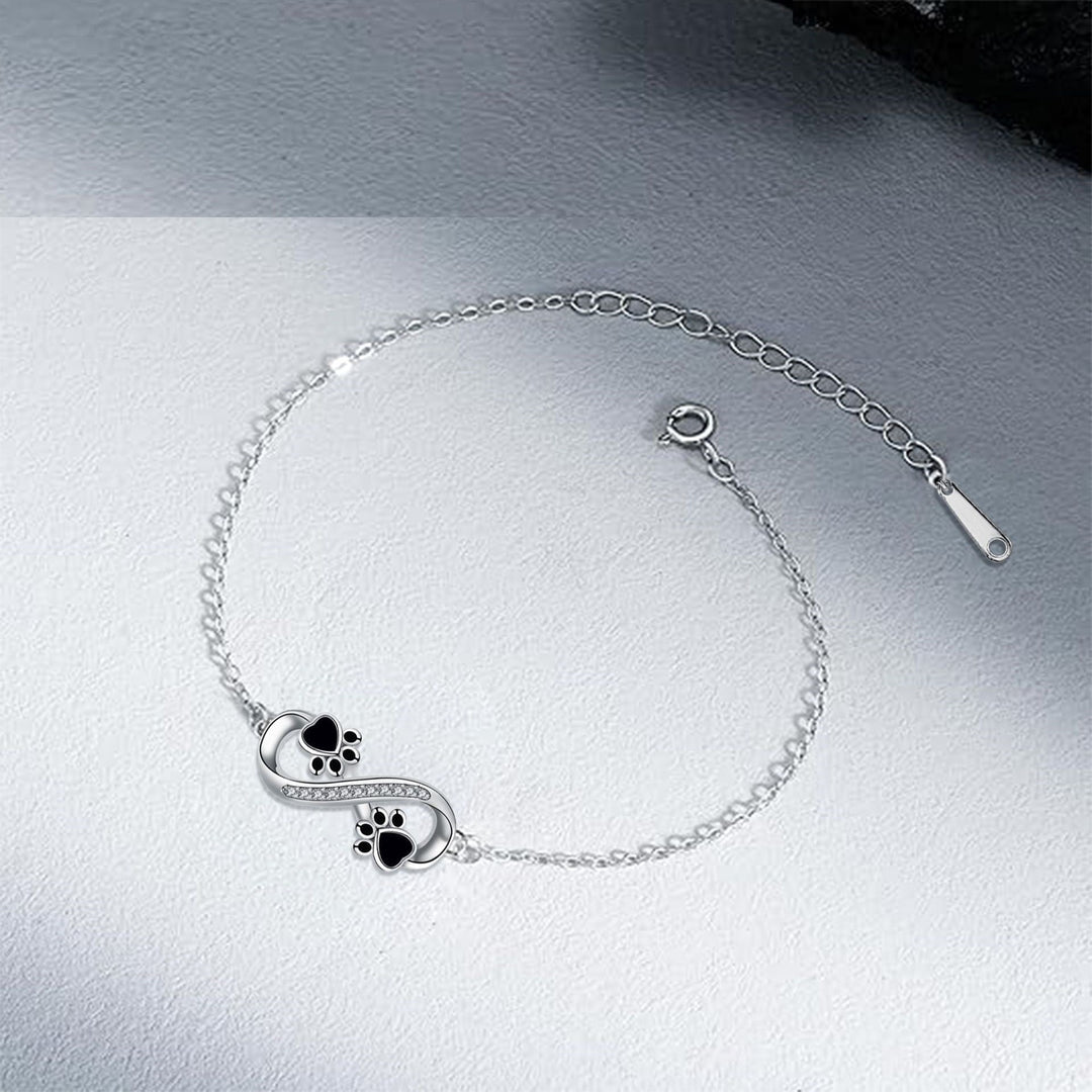 Pulsera con Charm de Huella y Símbolo de Infinito en Circonitas